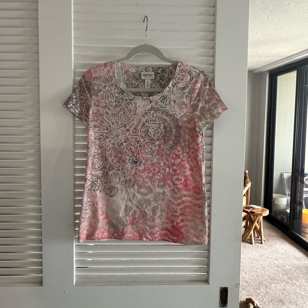 Chico’s Zenegy Size 0 fits medium. Embellishments are silver and sparkly. Poly